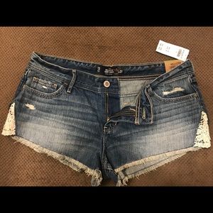 Brand new hollister jean shorts with lace detail